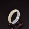 Yellow jade Burma oval shape 52mm