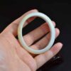Yellow jade Burma oval shape 52mm - Image 3