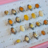 Natural amber ring with an open back, from different angles