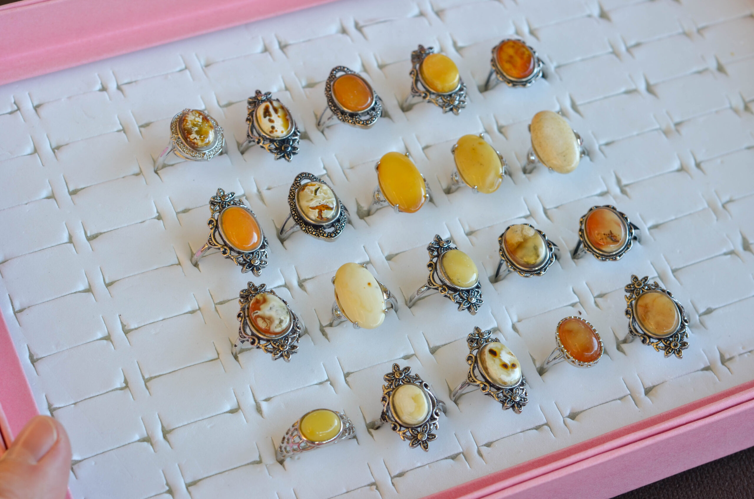 Natural amber ring with an open back, from different angles