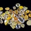 beautiful collection of natural golden rutilated quartz cabochons with stunning golden needle inclusions inside clear quartz crystal.