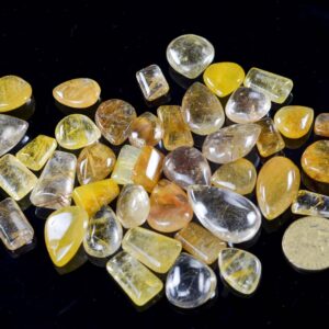 beautiful collection of natural golden rutilated quartz cabochons with stunning golden needle inclusions inside clear quartz crystal.